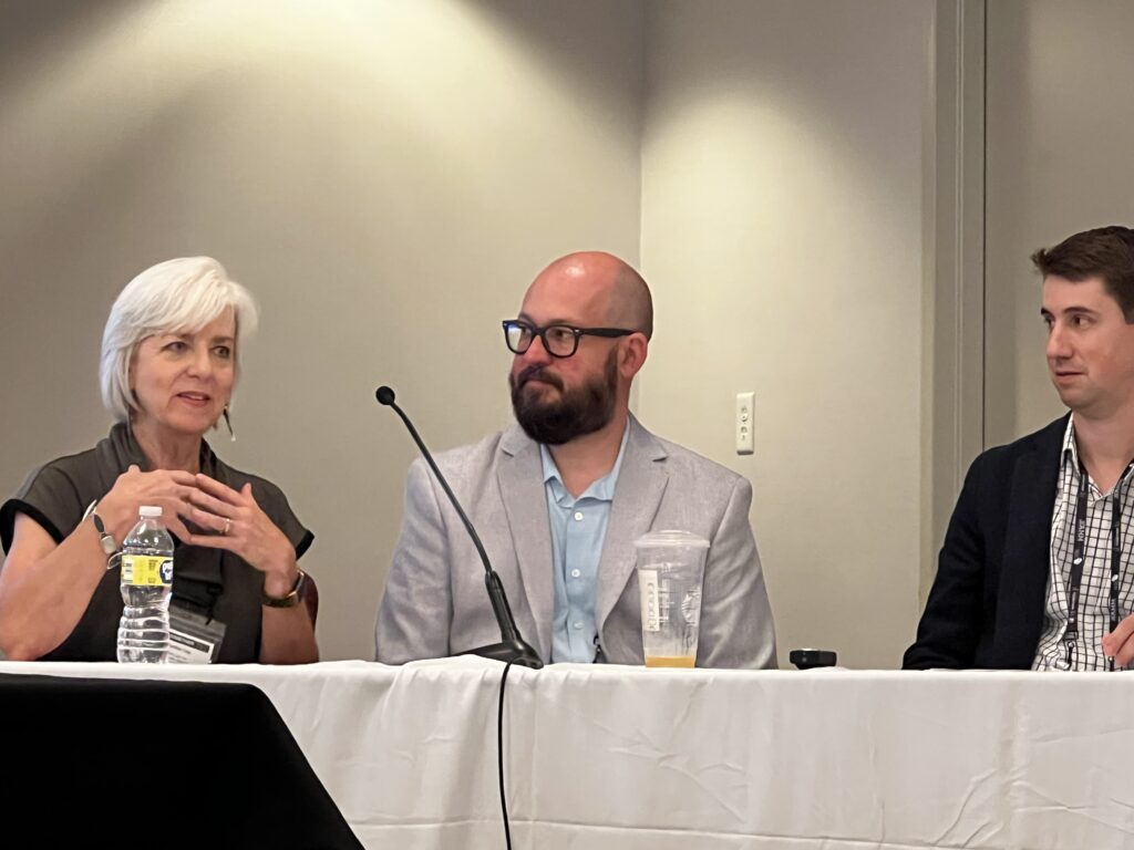 Photo features Solid Light staff, Cynthia  Torp and Chris Mozier, with guest panelist, Jesse Kramer from Conner Prairie, during their conference session.